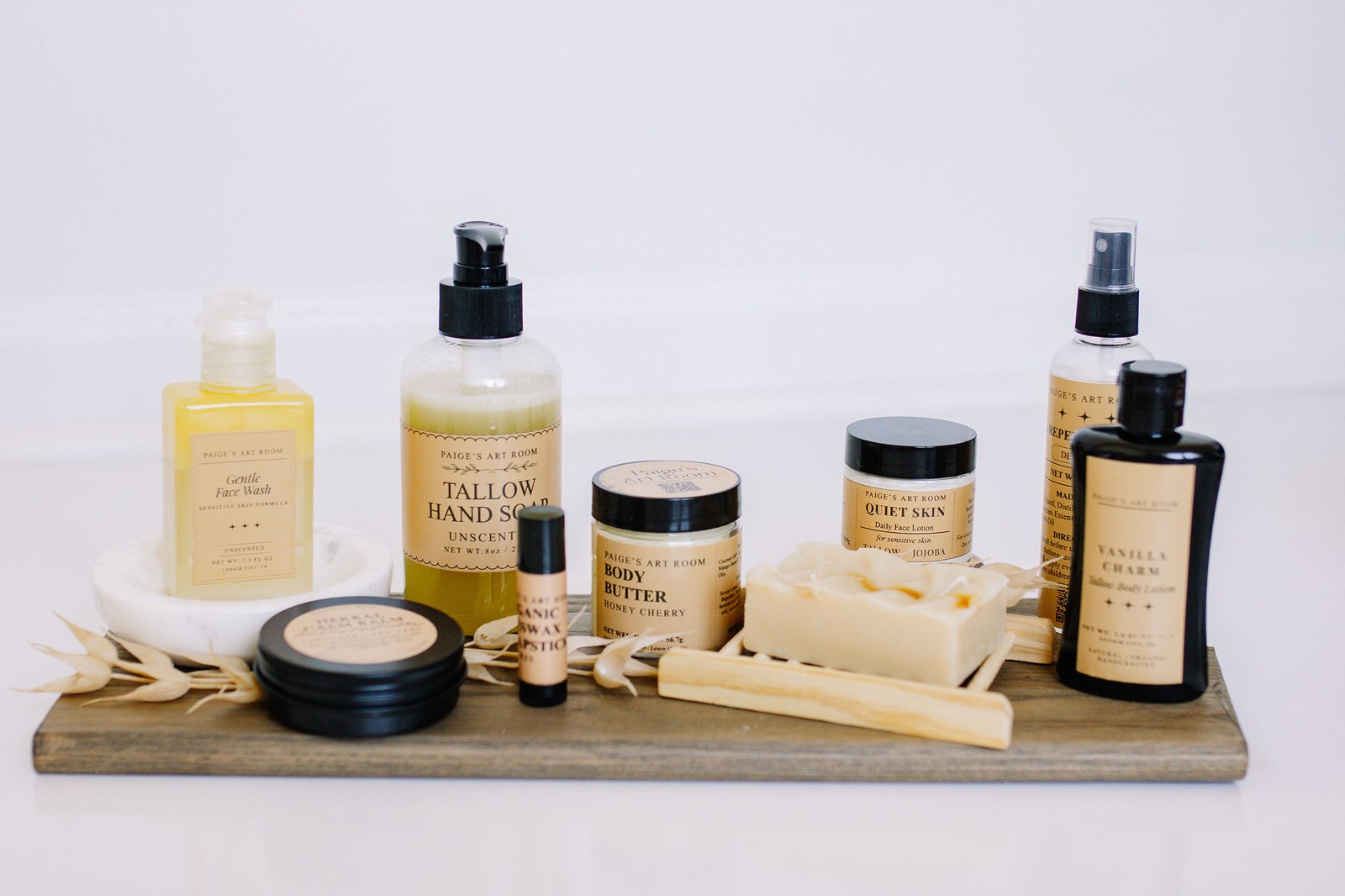 Paige’s handcrafted soaps, tallow skincare and body care arranged together