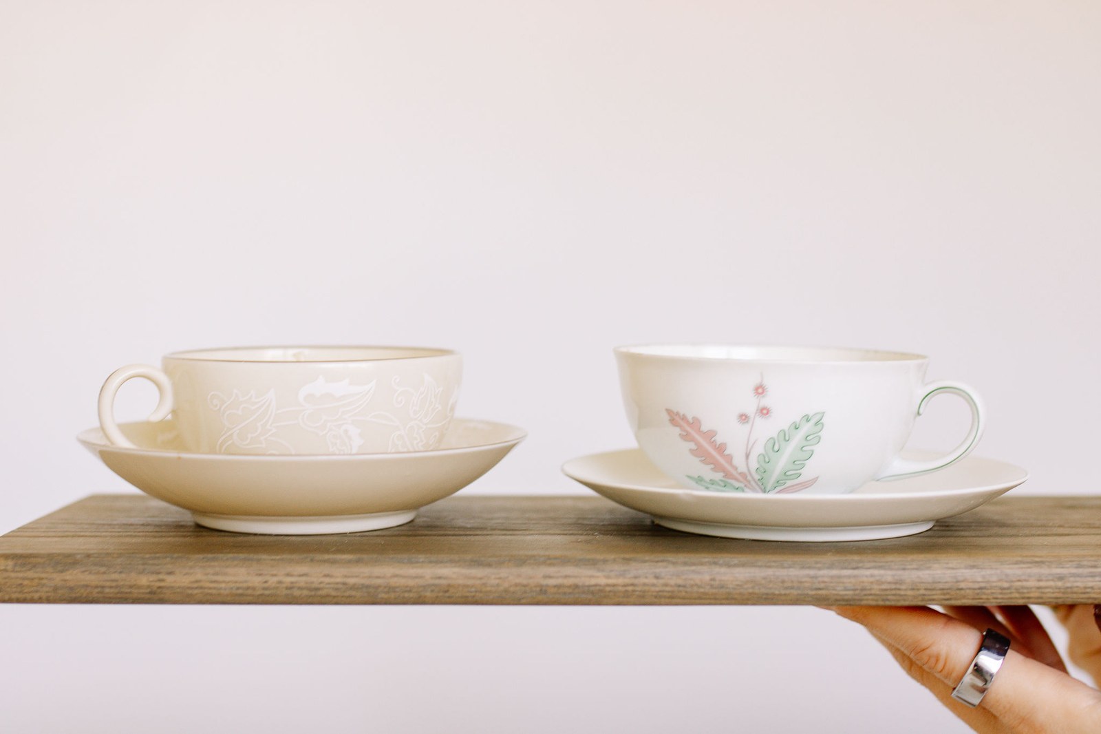Hand-poured candles in thrifted teacups